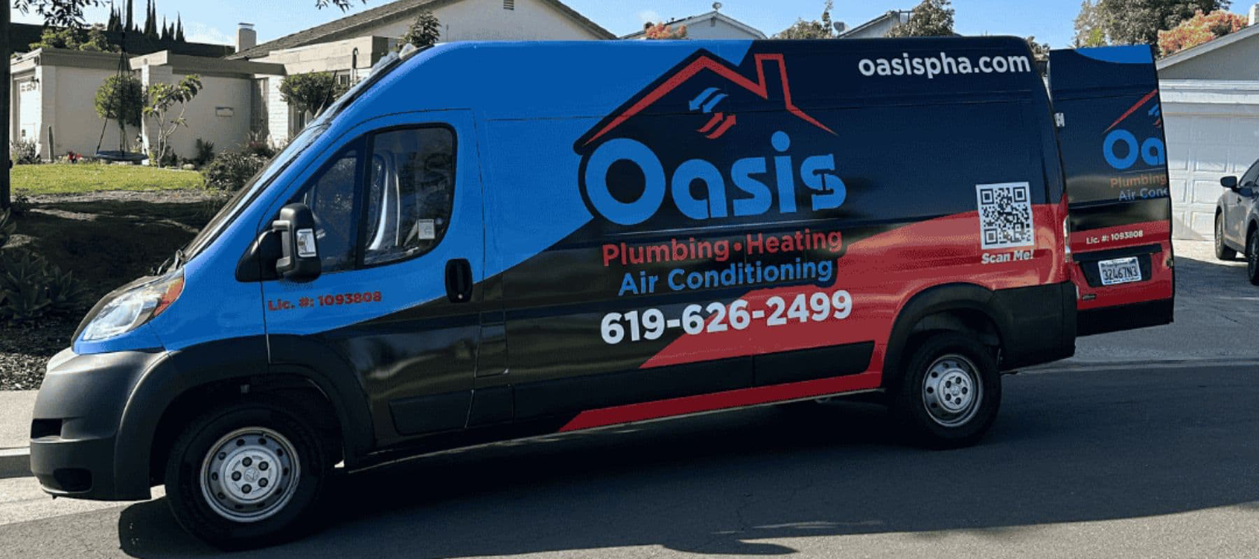 A branded Oasis Plumbing, Heating, and Air Conditioning service van parked in a residential neighborhood